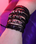 Badass Six Piece Braided Leather Bracelet Set For Men And Women Adjustable Hemp Rope Wristbands With Classic Skull Charm Punk Rock Style Fresh Daily Bling worn on wrist showing black leather and skull details.
