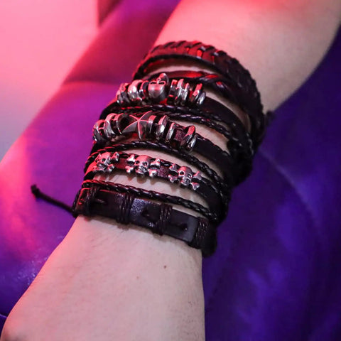 Badass Six Piece Braided Leather Bracelet Set For Men And Women Adjustable Hemp Rope Wristbands With Classic Skull Charm Punk Rock Style Fresh Daily Bling worn on wrist showing black leather and skull details.