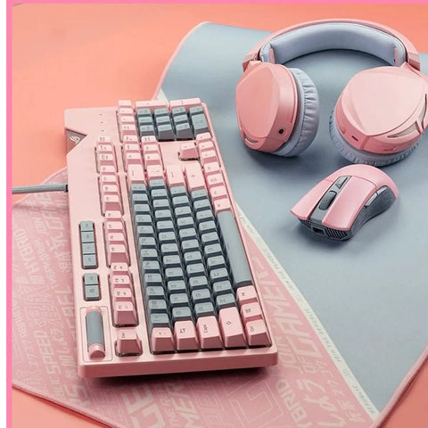 Dope Pink Mechanical Gaming Keyboard And Mouse Combo With Full Spectrum RGB Backlighting on a soft mouse pad with headphones.