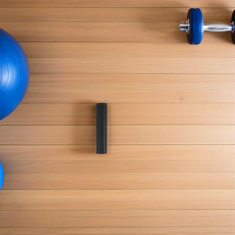Ergonomic Lifting Handle Covers For Dumbbells And Barbells Non Slip Plastic Grips on wooden surface with gym equipment