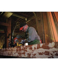 Pro Grade 20V Max Xr Brushless Cordless Planer Drops Dead Serious Amps For Zero Drag wood planing in a workshop.