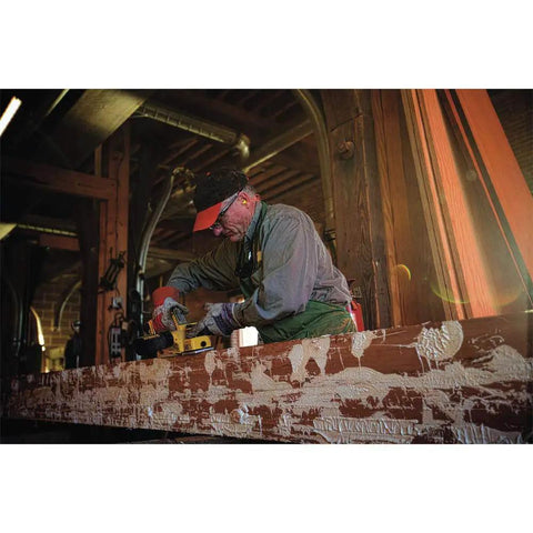 Pro Grade 20V Max Xr Brushless Cordless Planer Drops Dead Serious Amps For Zero Drag wood planing in a workshop.