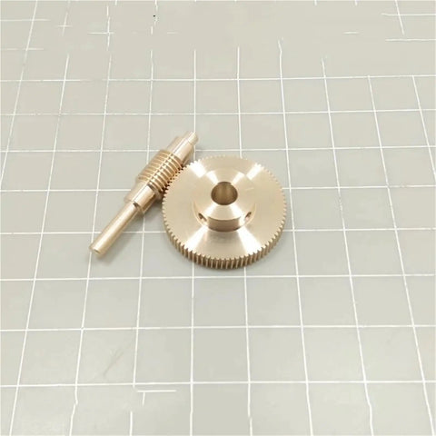Precision 0.3 Module Worm Gear Reducer With 1 To 80 Ratio And 100 Teeth, gold-colored gears and shaft assembly.