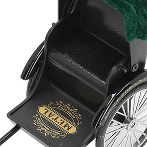 Close-up of Retro Alloy Rickshaw Model Miniature Decor showcasing legit vintage charm with detailed black seating.