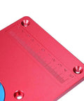 Premium Universal Aluminum Router Table Insert Plate With Heavy Gauge Ring For Kick Butt Performance And No Fuss Setup Works Flawlessly With Standard Drill Chucks 235X120X8Mm close-up showing red color and measurement scale.