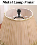 Metal Lamp Finial securing black shade on 10 inch Solid Build Black 10 Inch Lamp Shade Harp Holders 2 Pack Heavy Duty Metal Table And Floor Fixture Adapters With A Slick Electroplated Finish That Gives Your Home Decor A Sharp Fresh Vibe Today.