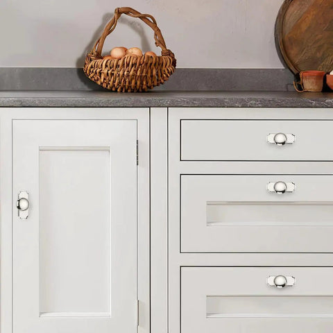 Hella Durable 2 Pack Polished Nickel Cabinet Knobs With Backplates on white cabinet with eggs in basket, highlighting 2.8-inch design.