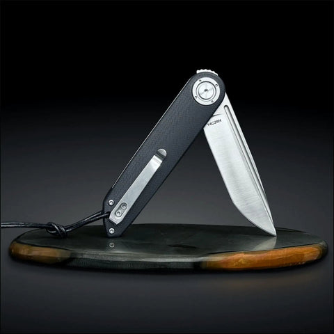 Edc Pocket Folding Knife With 3.5 Inch 14C28N Blade, ball bearing action, liner lock, Micarta handle, displayed upright on stand.