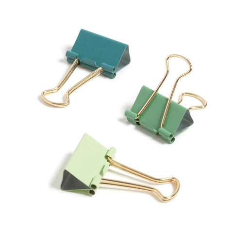 Three green and teal binder clips from the Succulent Garden Office Accessory Kit With Sticky Note Pad, Gold Paper Clips, Sphere Push Pins, Succulent Magnets And Binder Clips To Elevate Your Desk Setup, Boost Productivity And Flaunt Your Desk Vibe.