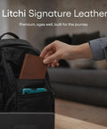 Straight Up The No Sweat Apple Find My Compatible Passport Holder With Built In Tracking And Mfi Certification Featuring Heavy Duty Rfid Shielding Plus A Three Year Rechargeable Battery For Super Smooth Trips In Brown being placed in a backpack pocket.