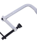 Heavy Duty F Clamp With Removable Swivel Pads And Deep 8 Inch Jaw For Serious Welding And Woodworking Projects That Need Real Grit And Grip To Hold Things Tight, showing metal construction.