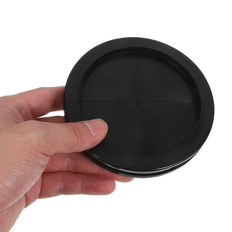 Double Sided Rubber Cable Grommet Kit For Desk Cable Holes, 12 Pack Black Round Hole Seals, hand held close-up