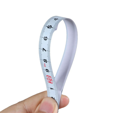 Precision Folding Tape Measure And Measuring Ruler Kit For Tough Woodworking Jobs High Visibility White Finish held in hand showing clear markings.