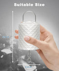 Hand holding a compact disco ball motor with remote for 6 to 20 inch mirror balls, suitable size for home party decor