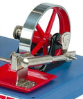 Close-up of engine parts in Deluxe Steam Engine Kit D5 For DIY Gearheads And Educators with polished finish.