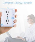 Person holding Six Outlet Wall Tap Extender With Surge Protector 900J Three Side Wide Spaced Power Strip against laptop background