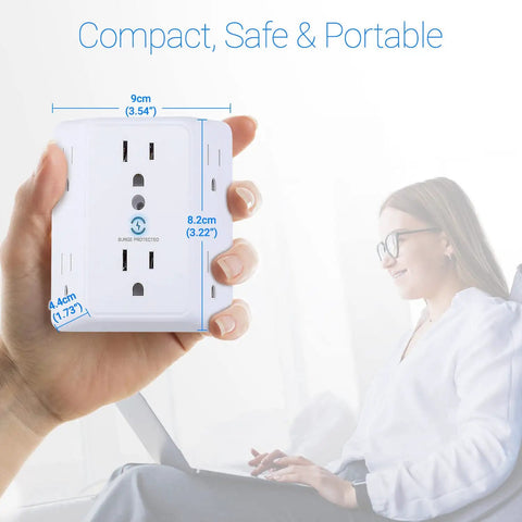 Person holding Six Outlet Wall Tap Extender With Surge Protector 900J Three Side Wide Spaced Power Strip against laptop background