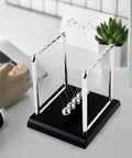 Pendulum Balance Newton's Cradle Steel Balls For Science Experiments And Desk Decor, Stainless Steel Mirror Finish on table