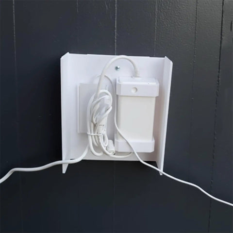 Premium Outdoor Electrical Box Cover Weather Resistant Dustproof Shield For Power Adapters mounted on a wall with cables tucked.