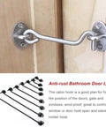 Beefy Metal Door Hook And Eye Latch For Porch Gate And Pantry Cabinet With Rustproof Mounting Screws For No Sweat Diy Setup. Stainless steel latch mounted on wooden door.