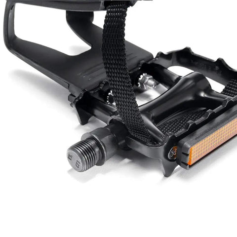 Close-up of Toe Clip Bike Pedals With Straps For 9 Sixteenth Inch Axles Universal Fit No Slip Grip Durable Lightweight Alloy And Resin