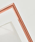 Close-up of rose gold corner arc in Montage Modern LED Floor Lamp for Living Rooms and Offices Tall Standing Corner Pole Lamp for Bedroom Reading
