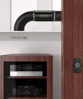 RAXIAL S4 Inline Booster Duct Fan 4 Inch with Speed Controller, installed in a modern wooden cabinet for ventilation.