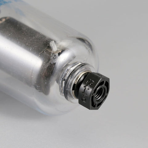 Close-up of Inline Pro Grade Air Filter And Moisture Trap with Automatic Drain showing 1/4 inch NPT port detail.