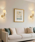 Wireless Vintage Wall Sconce Set Of Two Rechargeable Dimmable RGB Lights With Remote Antique Brass And Fabric Shade truly wire free setup beside a sofa.