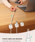 9 Pack Magnetic Cable Clips for Easy Cable Management under desk, shown holding cables with adhesive backing, 7.5 mm slots.