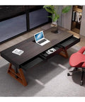 Smooth Electric Lift Standing Desk With Drawer Storage And Usb Charging Port Adjustable Height Home Office Table Built Different For Crushing Your Daily Grind In Sleek Black viewed from above showing laptop, drawer, and chair.