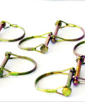 Close-up of PTO Pin Set 20 Piece Assortment for Power Take Off Hubs and Implements, yellow zinc plated, heavy duty use.