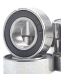 Close-up of Ten Pack 8x16x5 mm ABEC-7 RC Car Bearings With 2RS Sealed Black Finish For Hobby Trucks And Buggies