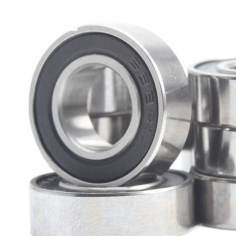 Close-up of Ten Pack 8x16x5 mm ABEC-7 RC Car Bearings With 2RS Sealed Black Finish For Hobby Trucks And Buggies