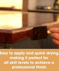 Applying Heavy Hitter Danish Oil Wood Sealer on a wooden countertop for a satin finish and protection against water rings.