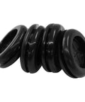 10 Pack 3/4 Inch Inner Diameter Rubber Grommets Black Double Sided Round Hole Plugs For Electrical Boxes, Cable Management And Automotive Wiring Fits Standard 1 Inch Knockout Holes And Delivers Rugged Heavy-Duty Weatherproof Protection, close-up view of stacked grommets