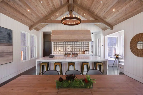 Legit Reactive Water Based Wood Stain With A Slick Reclaimed Vibe Weathered Tan Tones Hit Different On Any Surface Voc Free Solid Formula For Interior Or Exterior Jobs In 55 Gallon Drum used in a modern kitchen with wood beams and a marble island.