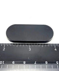2 Inch By 3/4 Inch Oval Silicone Bumper Feet 3/16 Inch Thick With Strong Adhesive Backing next to ruler for size reference