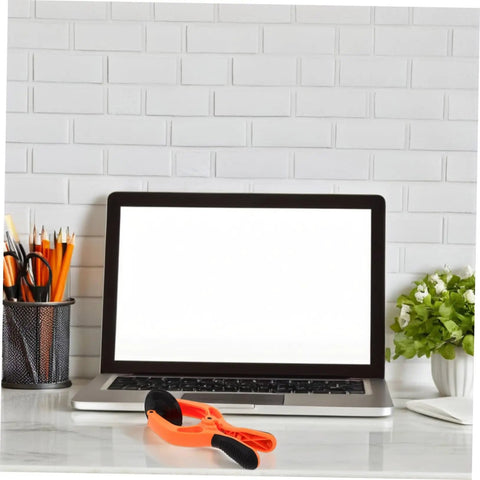 Laptop on a desk with a Phone Screen Opening Tool Kit With Suction Cups And Pliers For Quick Screen Repairs in front.