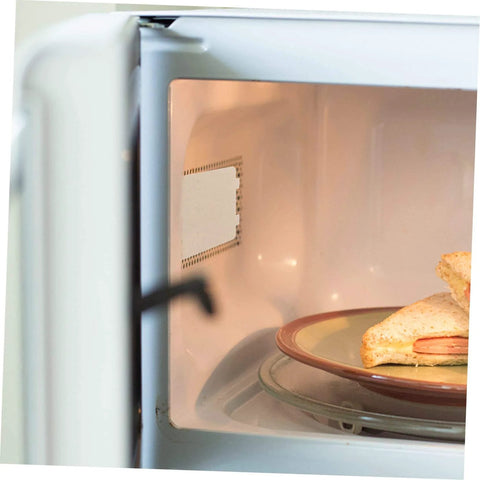 Microwave with 10Pcs Microwave Oven Mica Sheets For Heat Resistance And Insulation visible on right wall, protects from burnout.