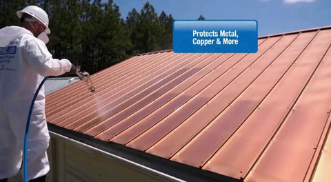 Man applying Heavy Duty Tough As Nails Clear Roof Sealer on a copper metal roof to stop leaks.
