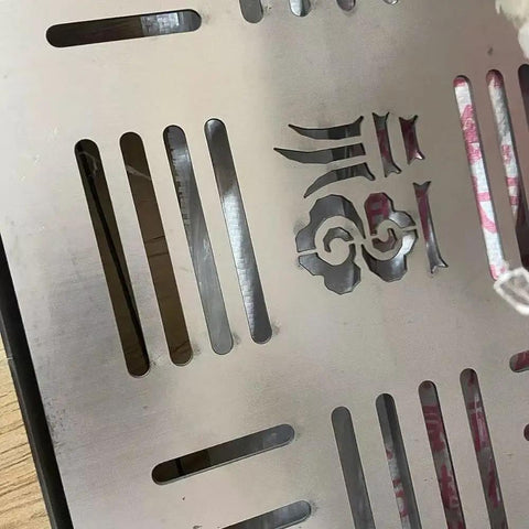 Smooth Operator 304 Stainless Steel Square Shower Drain Cover And Yard Catch Basin Grate close-up view with decorative slits.
