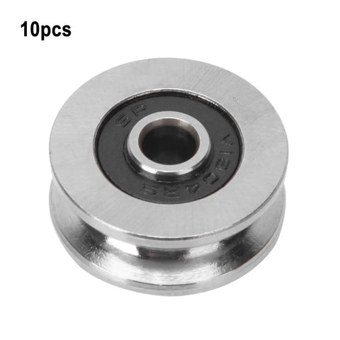 Rock Solid V Groove Track Roller Bearings TV0418 10 Pack 4x18x8mm Steel Guide Rail Bearings showing a single steel track roller with black bearing.