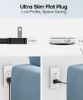 Ultra slim flat plug of GaN PD 450W 10 Ports USB C And USB A Charger Hub beside wall outlet and furniture.