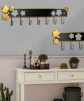 Rugged Retro Wall Coat Rack Carbon Steel Hooks Sturdy Entryway Hangout Heavy Duty Storage For Coats Hats Towels And Purse Durable Bathroom Decor 7 Hook Top Shelf Quality Build on wall with flower accents in gold and black.