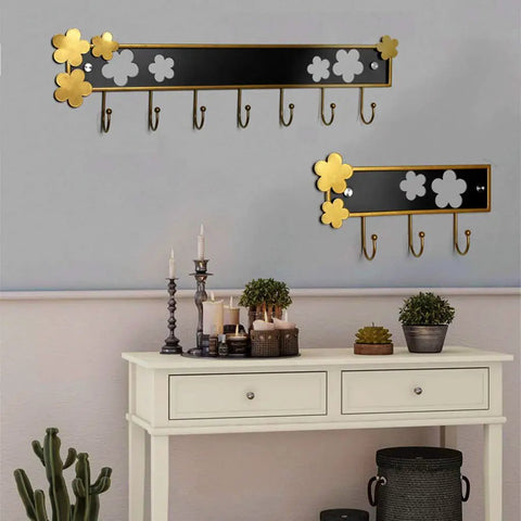 Rugged Retro Wall Coat Rack Carbon Steel Hooks Sturdy Entryway Hangout Heavy Duty Storage For Coats Hats Towels And Purse Durable Bathroom Decor 7 Hook Top Shelf Quality Build on wall with flower accents in gold and black.