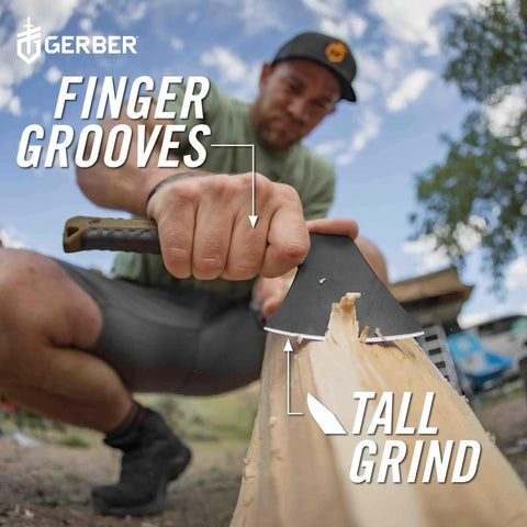 Man using Compact Pack Hatchet with 3.5 Inch Steel Blade, full tang, ergonomic rubber grip for comfortable chops on wood.
