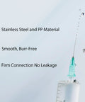 Slick 100 Pack 18 Gauge 1 Inch Stainless Steel Syringe Needles Featuring Tight Luer Lock Seal Individually Wrapped For Lab Tasks And Refilling Liquids Built Tough No Sweat High Performance Guaranteed, showing stainless steel needle with droplets.
