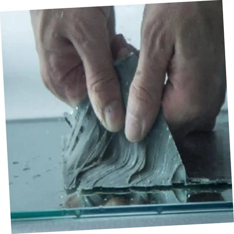 Application of Butyl Aluminum Foil Sealing Tape for Emergency Repairs and Leak Stops, no mess weatherproof patch on glass surface