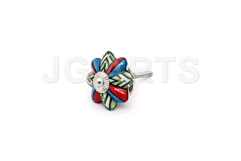Set Of Ten Totally Rad Vintage Ceramic Drawer Pulls And Cupboard Cabinet Door Knobs Featuring Super Sleek Multicolor Designs Plus Rock Solid Chrome Hardware. Close-up of vibrant ceramic knob with flower design in red, blue, and green colors.